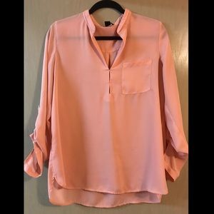 Pink blouse with pocket detail